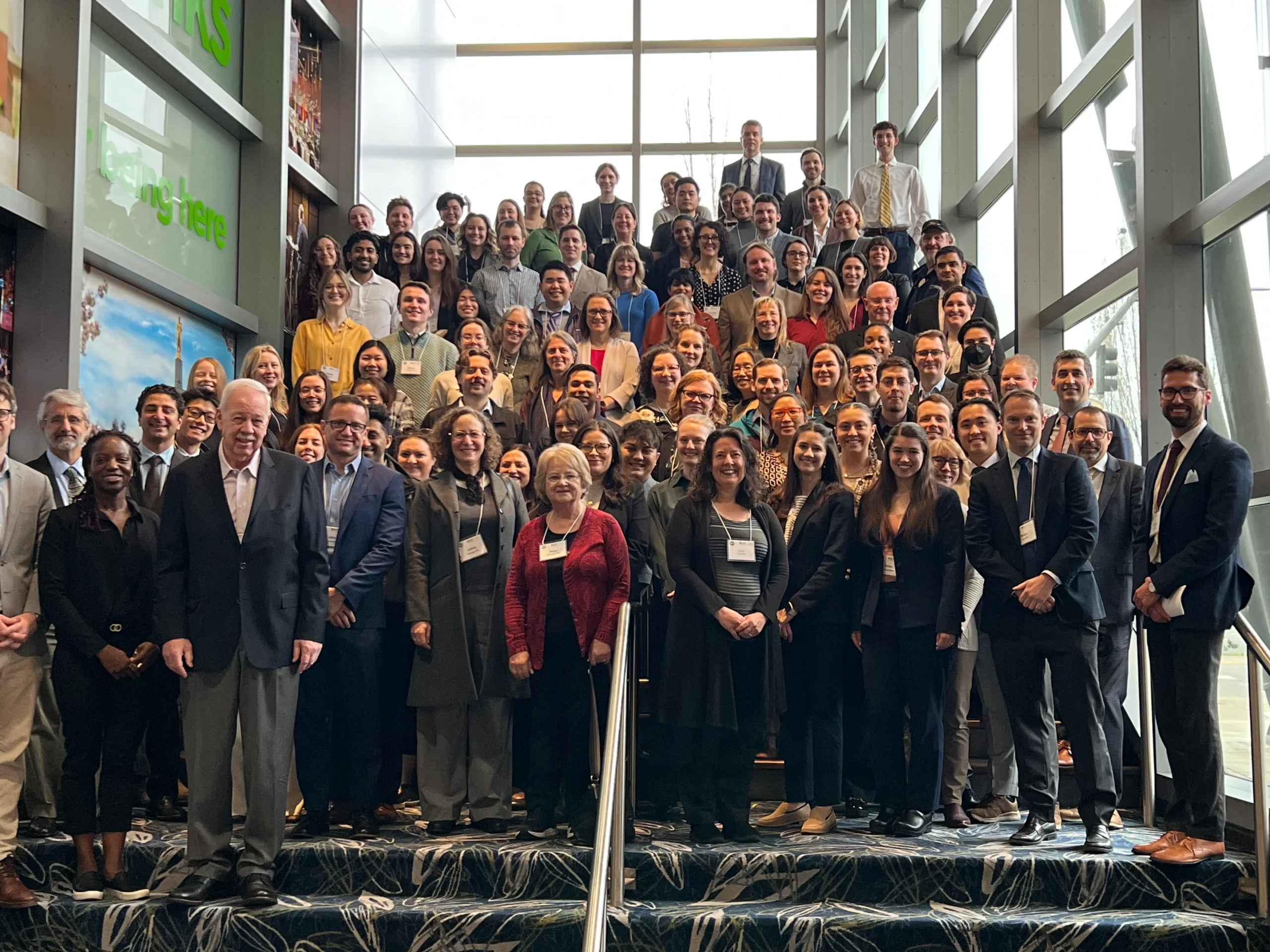 Walking elderly person in wheel chair into the sunset